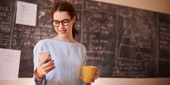 Checking her emails before class