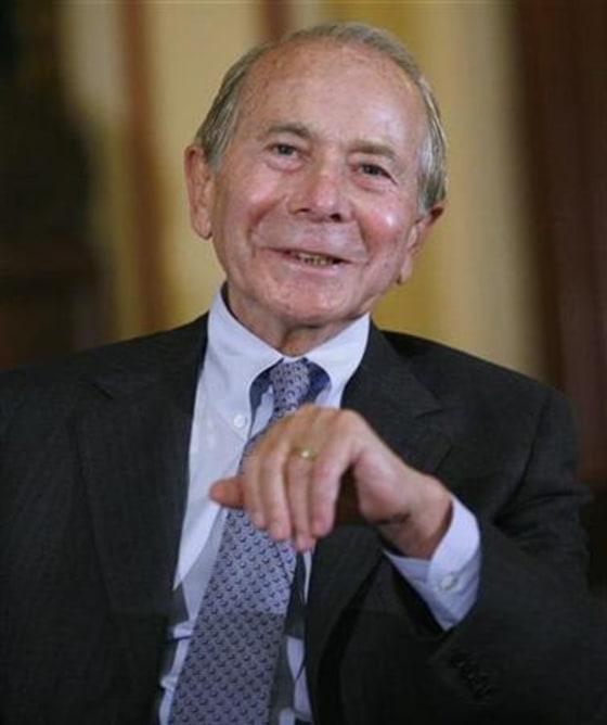 Maurice "Hank" Greenberg, former Chairman and CEO of AIG Insurance, is seen speaking at the Wall Street Journal conference in New York last year. AIG is suing Greenberg and six other former directors and officers, accusing them of breaching their fiduciary duty.