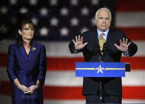 Republican presidential nominee Senator John McCain speaks to the crowd during his election night rally in Phoenix