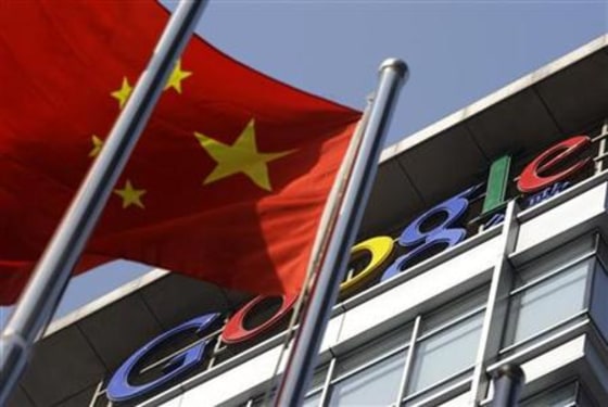 A Chinese national flag sways in front of Google China's headquarters