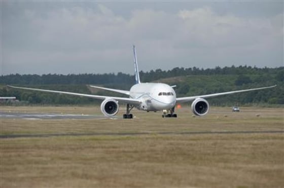 The Boeing 787 Dreamliner aircraft taxis on the runway at Farnborough airport in Farnborough, southern England