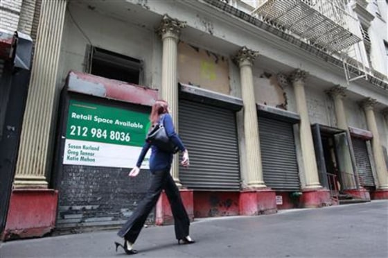A woman walks past the lower Manhattan building that will possibly house the Cordoba Initiative Mosque and Cultural Center in New York