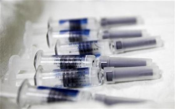 Vaccines are placed on a tray inside the Taipei City Hospital