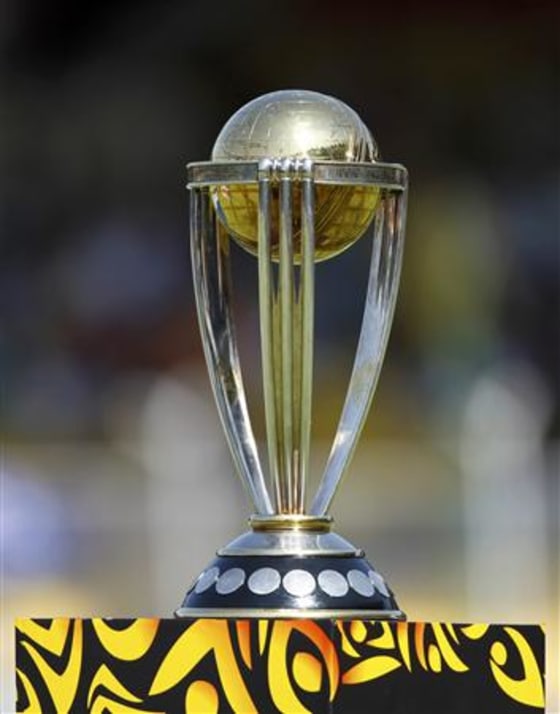 The ICC Cricket World Cup 2011 trophy sits on a pedestal in Ahmedabad