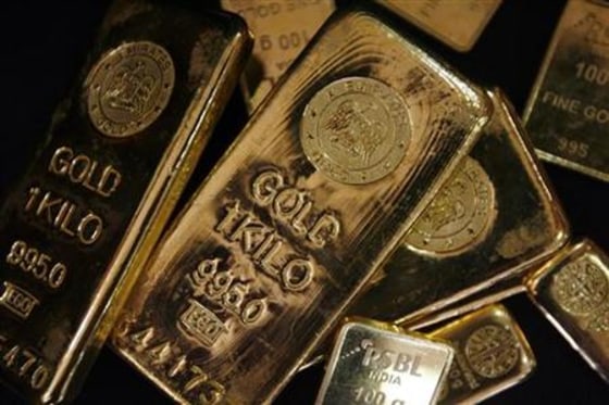 Gold bars are displayed to be photographed at bullion house in Mumbai