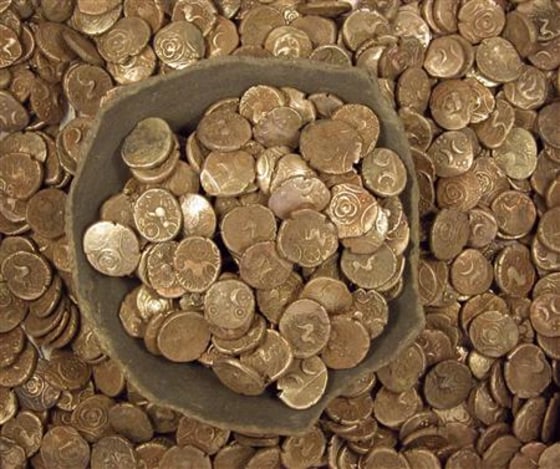 A hoard of Iron Age gold coins found in Suffolk, southeast England in 2008 is seen in an undated photo