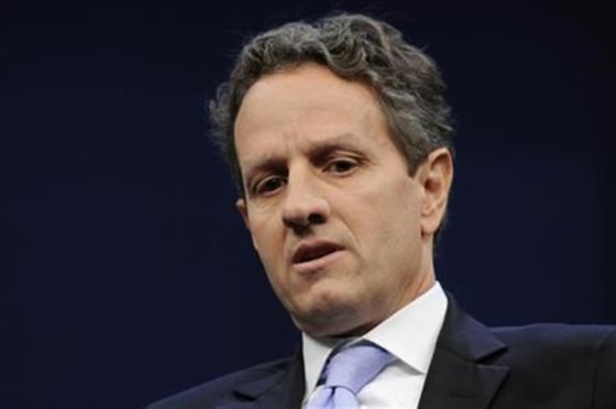 U.S. Treasury Secretary Geithner sits onstage for an interview with Politico's Mike Allen at the Newseum in Washington
