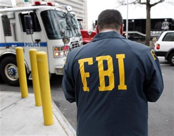 An FBI Special Agent is seen in Queens, New York March 25, 2010.
