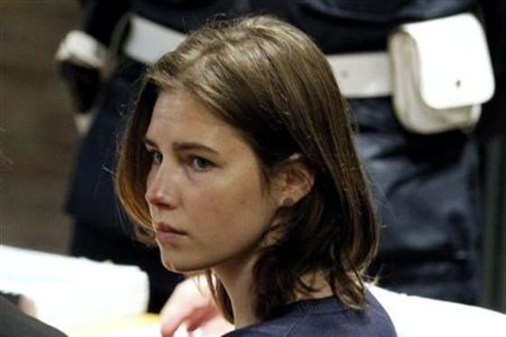 Knox, the U.S. student convicted of killing her British flatmate in Italy three years ago, sits in the courtroom before a trial session in Perugia