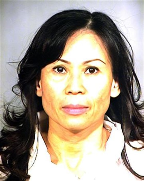 Catherine Kieu Becker seen in a police mugshot