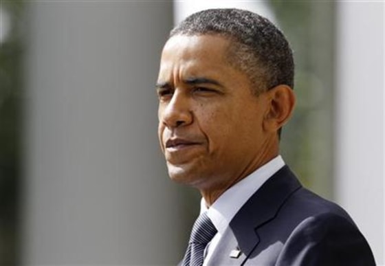 President Obama pauses as he talks about cutting the U.S. deficit by raising taxes, in Washington