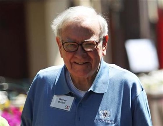 Berkshire Hathaway chairman and CEO Buffett walks to lunch during a break on the first day of the Allen and Company Sun Valley Conference in Sun Valley, Idaho