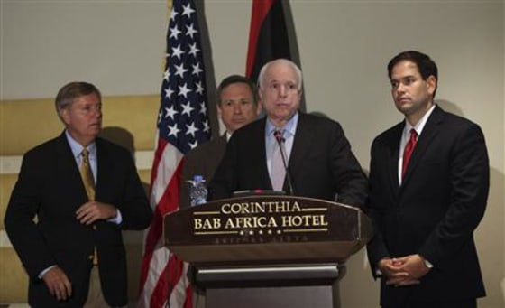 Senators Lindsey Graham, Mark Kirk, John McCain and Marco Rubio take part in a news conference in Tripoli