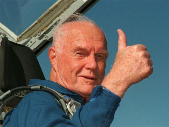JOHN GLENN GIVES THUMBS UP AS HE ARRIVES FOR SHUTTLE LAUNCH.