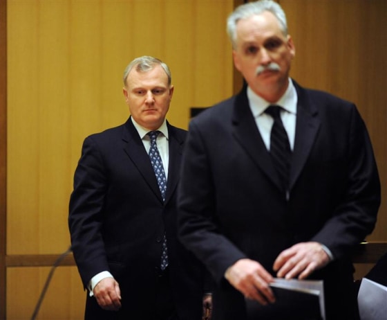 Morgan Stanley investment banker William Bryan Jennings and his attorney, Eugene Riccio, attend a hearing at State Superior Court in Stamford