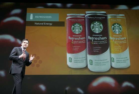 Starbucks president of Channel Development, Jeff Hansberry, talks to shareholders during its Annual Meeting of Shareholders