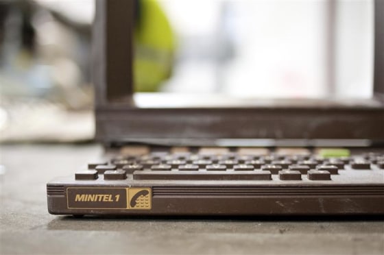 The plastic shell of a French Minitel terminal is broken down for recycling in Portet-Sur-Garonne