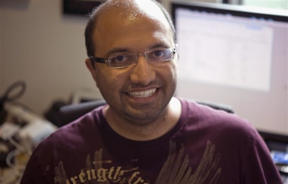 Computer benchmark tester Shimpi poses for Reuters in his office in Raleigh
