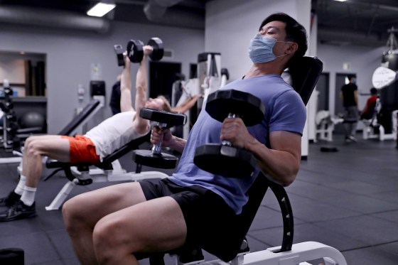 People Exercising Indoors During the Omicron Surge of the Coronavirus
