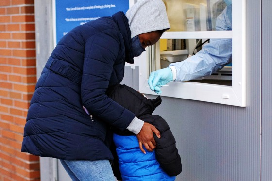 Image: A child receives a COVID test in New York on Dec. 23, 2021.