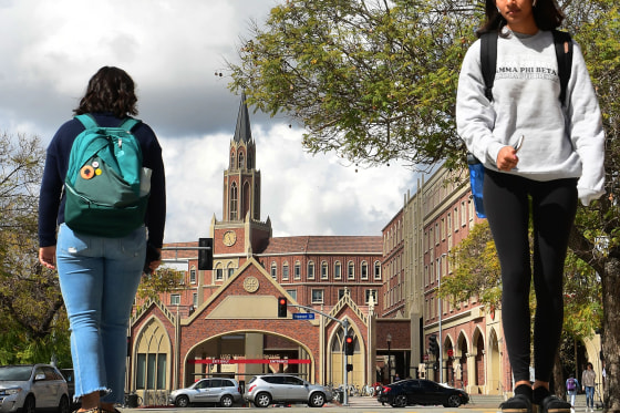 Image: Students walk on the campus at the University of Southern California in Los Angeles.