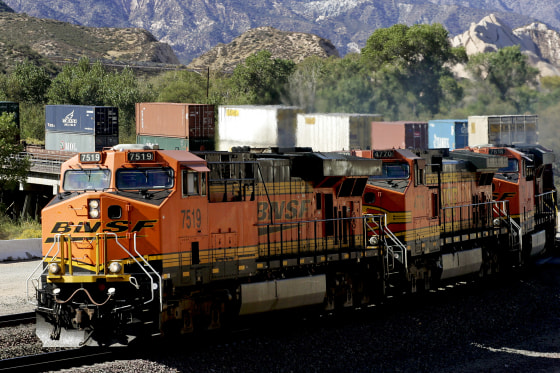A Burlington Northern Santa Fe train moves through Cajon Pass near San Bernardino, Calif., on Nov. 3, 2009.