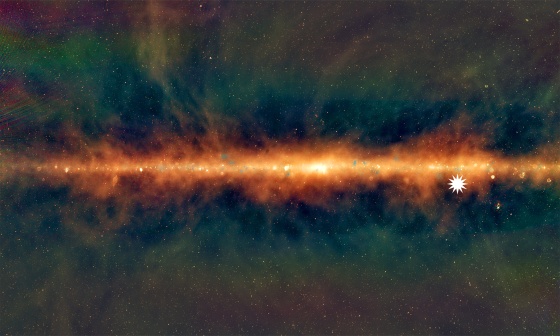 This image shows a new view of the Milky Way from the Murchison Widefield Array, with the lowest frequencies in red, middle frequencies in green, and the highest frequencies in blue. The star icon shows the position of the mysterious repeating transient.