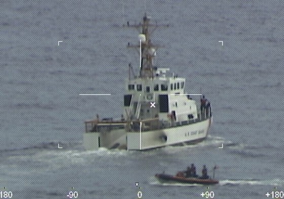 Coast Guard Cutter Ibis' crew searching for people missing from a capsized boat off the coast of Florida, on Jan. 25, 2022.