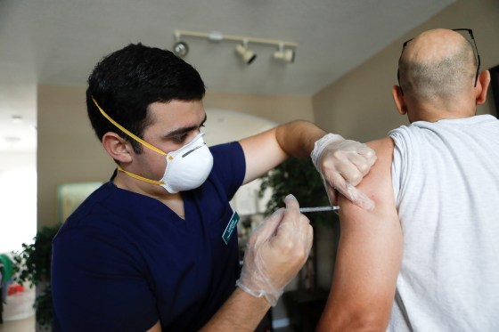 Image: Federal employee vaccine at home
