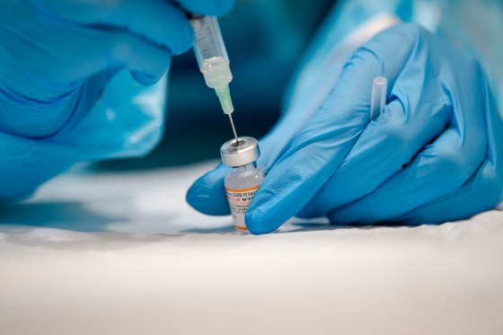 A nurse prepares the Pfizer-BioNTech Covid-19 vaccine in Montreal.