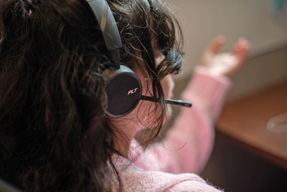 Image: Isabella Rowe takes a phone call at the Harris Center for Mental Health in Houston, March 7, 2022.