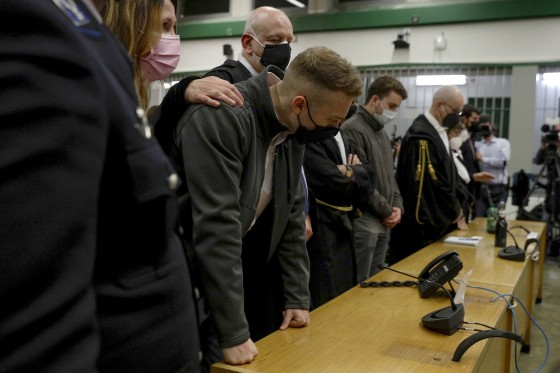 Finnegan Lee Elder, foreground, listens as the verdict is read on May 5, 2021, for the slaying of an Italian plainclothes police officer.