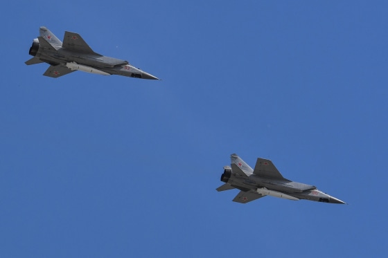 Russia's MiG-31 supersonic interceptor jets carrying hypersonic Kinzhal (Dagger) missiles fly over Red Square during the Victory Day military parade in Moscow in 2018.