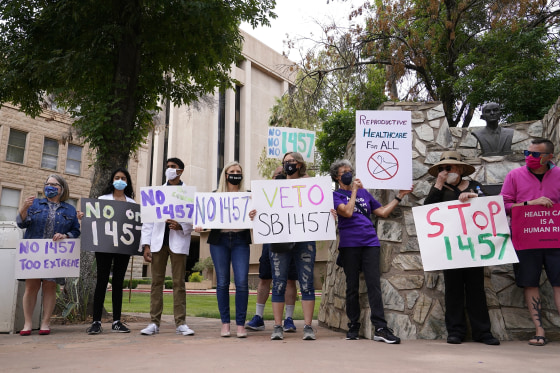Arizona reproductive health, rights and justice advocates protest an abortion bill at the Arizona Capitol in Phoenix on April 26.