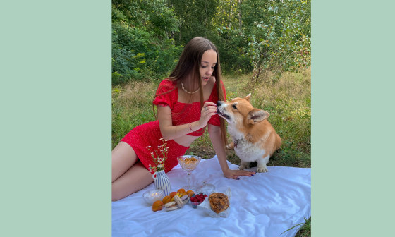 Anastasia Koshevaia and Chopa the Corgi.