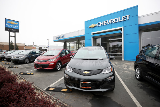 Chevrolet cars are displayed on the sales lot