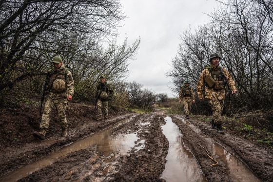 Ukrainian servicemen are seen along the frontline in Donbas, Ukraine on April 14, 2022.