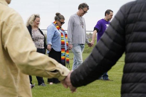A group of capital punishment protesters prays on the grounds of Riverbend Maximum Security Institution before the scheduled execution of inmate Oscar Smith on Thursday in Nashville, Tenn.