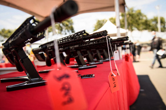 A TPM Arms LLC California-legal featureless AR-15 style rifle is displayed for sale at the company's booth at the Crossroads of the West Gun Show on June 5, 2021 in Costa Mesa, Calif.