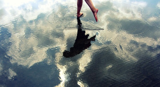 Woman Jumping On Beach