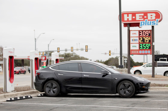A Tesla electric car charges