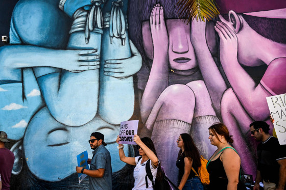 Abortion rights activists march in Miami on June 24, 2022.