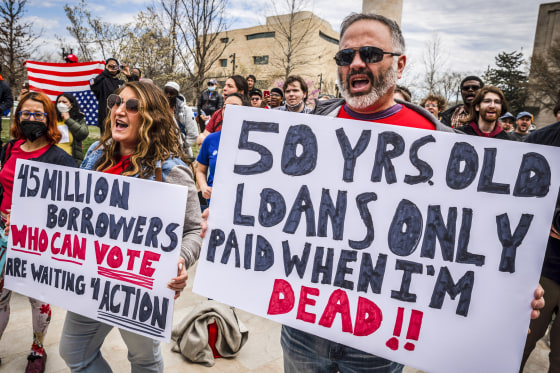 Image: People attend a rally against student debt outside the U.S. Department of Education in Washington on April 4, 2022.