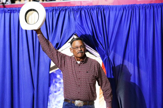 Mark Finchem, a Republican candidate for Arizona Secretary of State, waves to the crowd at a rally on July 22, 2022, in Prescott.