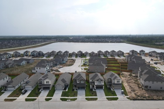 Image: New homes under construction in Arcola, Texas, on July 12, 2022