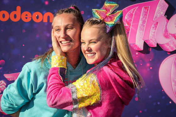 Kylie Prew and JoJo Siwa attend a drive-in screening and performance at the Rose Bowl on Sept. 3, 2021 in Pasadena, Calif.