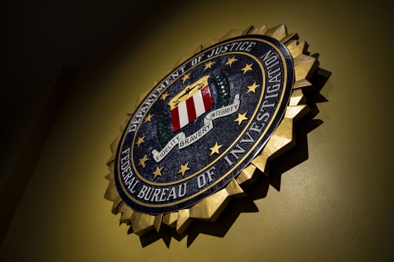 Image: The seal of the Federal Bureau of Investigation hangs on a wall at the FBI headquarters in Washington on June 14, 2018.