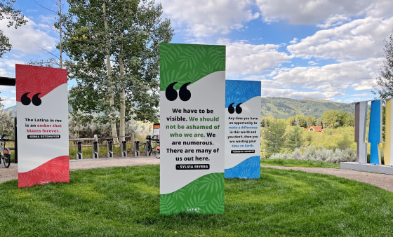 Signs at the Raizado Festival in Aspen, Colo.