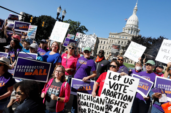 Image: Protesters gather outside the Michigan State Capitol during a "Restore Roe" rally in Lansing, Mich., on Sept. 7, 2022.