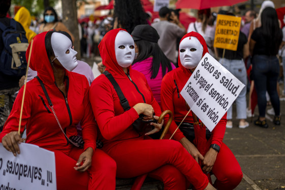 Sex workers and brothel owners protest a proposed law that would punish ...